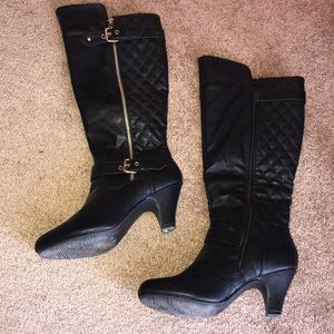 Black and gold boots